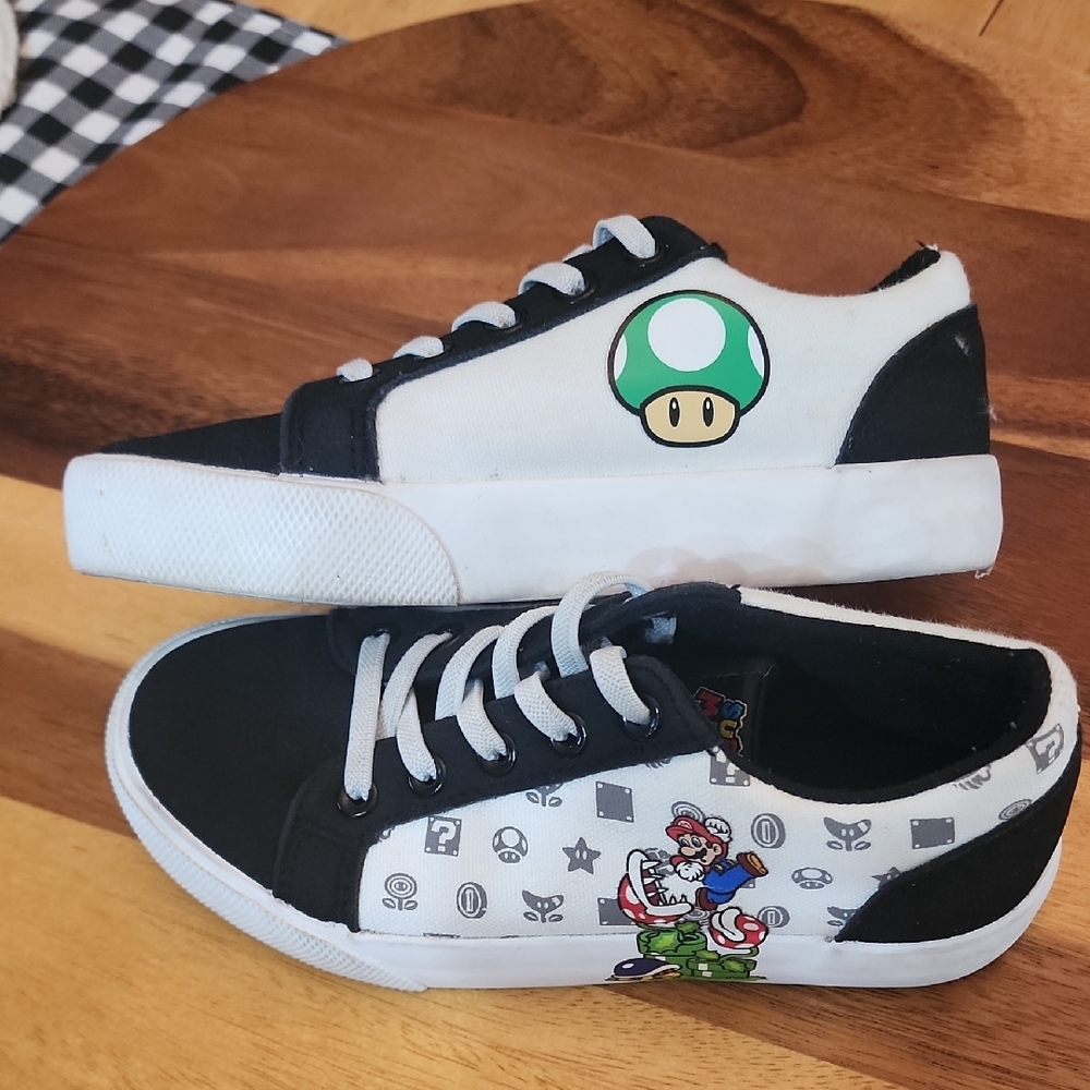 Nintendo Kids Black and White Mario Sneakers with Green Mushroom Accent